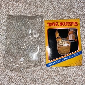 Travel necessities holder